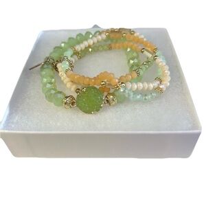 4 Green, Peach and Ivory Beaded Bracelets with Gold Accents